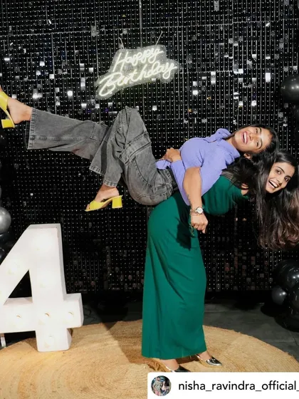 Fun and candid moments from a 24th birthday party, showcasing the modern shimmer wall and marquee number decor.