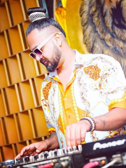 A shot of me at the console at Badmaash. I love the mix of traditional decor and modern party energy at this venue.