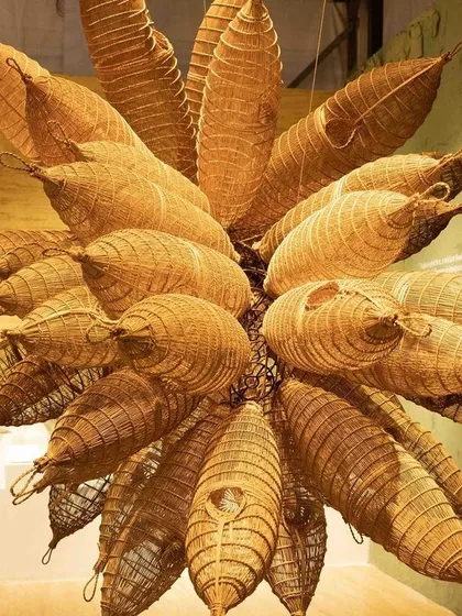 A sculptural rendition of a cluster of traditional Manipuri fish traps, known as 'Lu'. This piece was the centerpiece of our 'Edge of the Forest' installation, representing an inward journey to heal with ancestral wisdom.