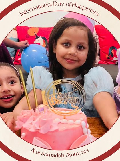 Happiness is homemade and frosted with love! Celebrating International Day of Happiness with this photo of a sweet little one enjoying her pink birthday cake.