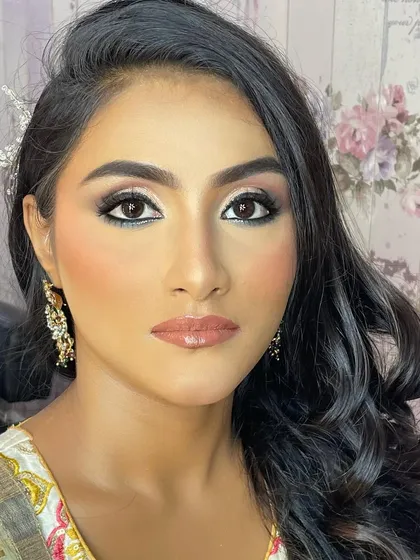This final shot shows the complete dewy makeup look, proving that you can be a versatile artist who masters multiple styles.