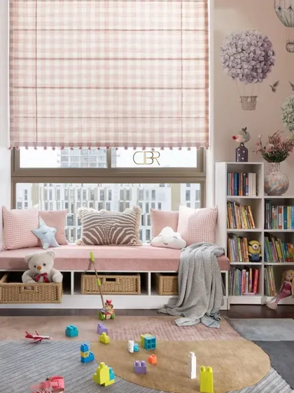 Designing for children is about creating a world of wonder that is also practical. In this kids' room, I used a soft color palette and whimsical details like hot air balloon decals to spark imagination, while incorporating smart storage and a cozy window seat to ensure the space is functional and grows with the child.