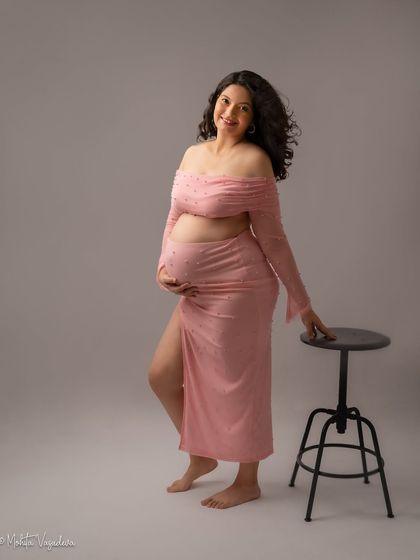 A full-length shot of the pink two-piece outfit, showing how we can create different looks with the same attire.