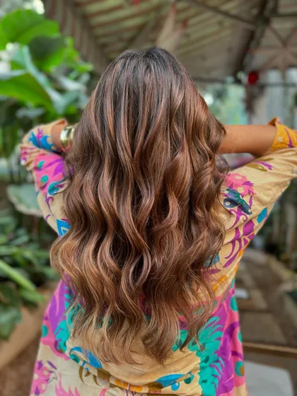 Another shot of this gorgeous bridal hair. The non-bleach color ensures the hair stays strong and shiny for all the wedding festivities.