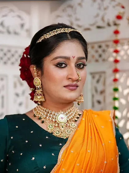 A modern take on the traditional Peshwai look. I focused on creating a flawless, radiant base and defining the eyes to complement the classic Maharashtrian jewelry and vibrant saree.