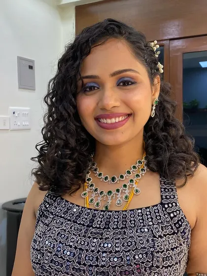 She looks absolutely radiant and ready for her celebration. It's a joy to help clients feel their best.