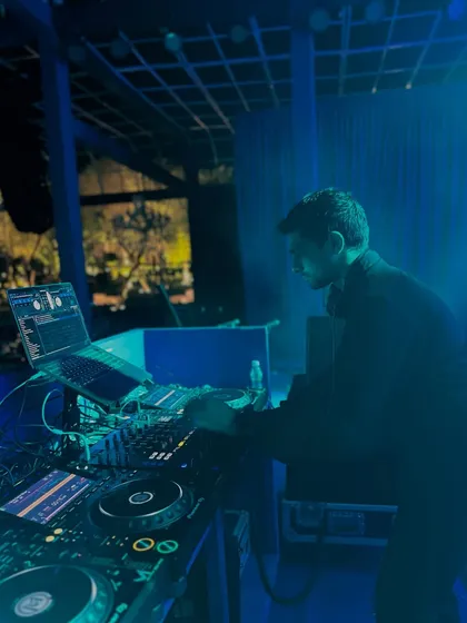 A cool blue-lit shot from another international gig. The grind of a world tour is intense but rewarding.