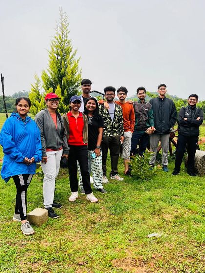 The team posing together at the homestay.