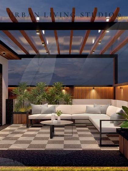 A render for an upcoming project in East Delhi. The design includes a lounge area with checkered flooring under a pergola, connected to an indoor room.