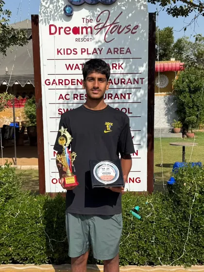 Prateek Sheoran holding his runner-up awards after the NS-UNDER16 singles tournament in Jaipur.