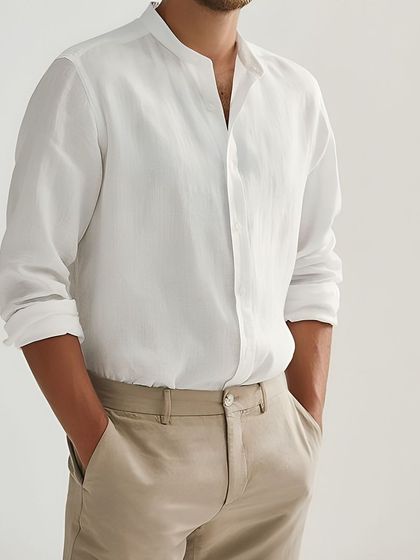 A custom-made white linen shirt with a mandarin collar. This is a sophisticated and modern option for smart-casual wear, perfect for staying cool in style.