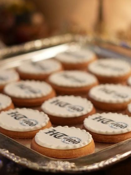 Custom-branded cookies for the Hindustan Times 100th anniversary. We offer bespoke options like these to add a personalized and memorable touch to any corporate celebration.