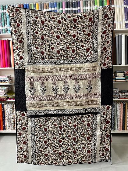 A full view of a saree quilt where we've incorporated the block-printed patterns into the overall design.