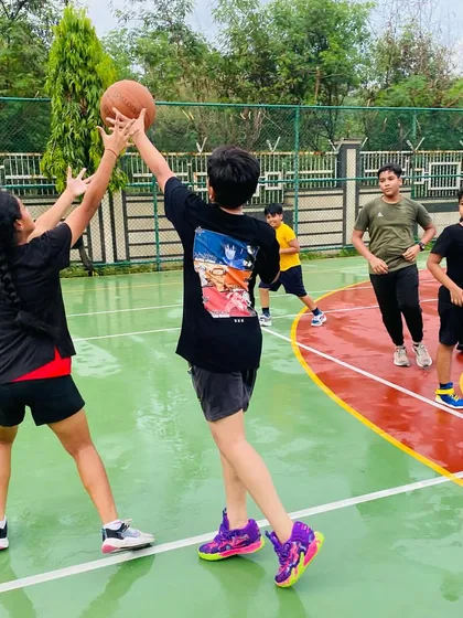 A female player defends a shot.