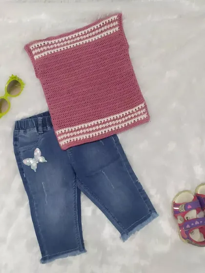 This flat lay shows how a simple handmade piece can create a stylish outfit. My Spirit Tee, with its delicate striped details, pairs perfectly with jeans for a casual, comfortable, and cute summer look.