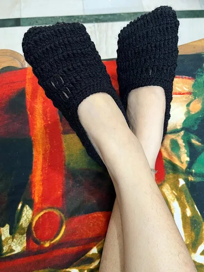 Another view of the handmade black crochet socks, showing the texture of the stitch work. I can make these in any color you like.