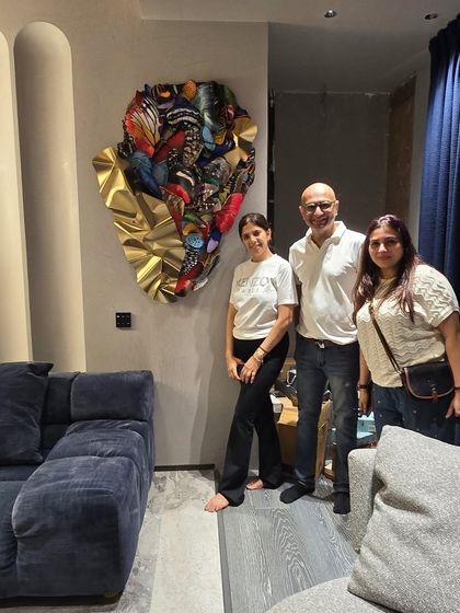 Posing with the clients next to the newly installed artwork. A successful collaboration is always the goal.