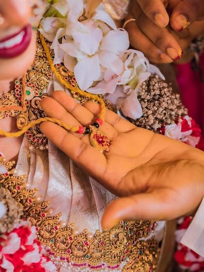 The sacred moment of the ceremony. The close-up shows the detail of the makeup and how it harmonizes with the traditional jewellery and rituals.