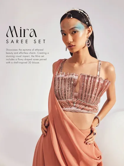 The Mira Saree Set showcases ethereal beauty. I created a stunning visual impact with a flowy draped saree paired with a unique, shell-inspired 3D pleated blouse.
