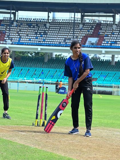 A young woman takes her stance at the ICC Criiio Cricket Festival. Our goal was to provide a professional and inspiring environment for the next generation of cricketers.