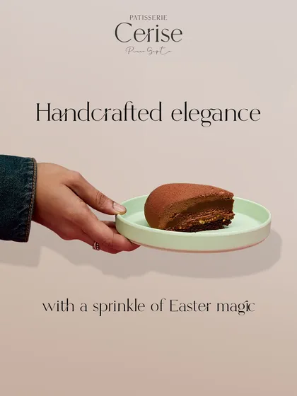 Handcrafted elegance. A slice of a chocolate entremet, perfect for a quiet moment of indulgence.