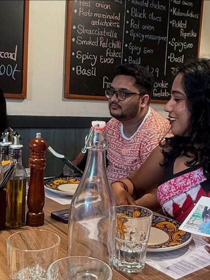Sharing stories and signing notes at our final group meal. The bonds formed during our intense five-week workshop often lead to lasting friendships and collaborations.