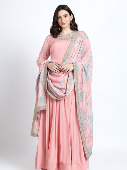 This extensive collection features a wide array of modern festive attire. From vibrant sharara sets and elegant anarkalis to chic jumpsuits and light lehengas, these pieces are curated for wedding guests and anyone looking for a stylish outfit for a special occasion.