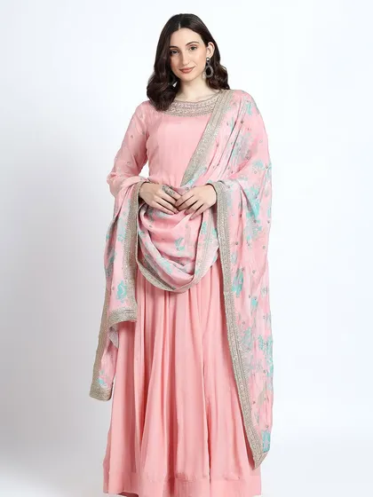 A full view of the pink anarkali, showcasing its flattering silhouette and graceful drape.