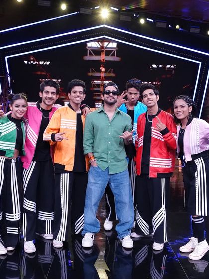 My crew, The Evokers, and I with our mentor on the show. This picture represents the teamwork and dedication that went into every single performance.