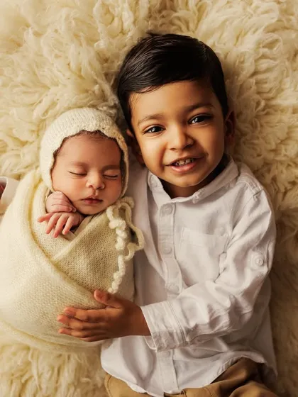 Welcoming a new baby is a milestone for the whole family. Capturing the gentle love and pride of a new big brother is one of the most heartwarming parts of my job. These are the moments that build the foundation of a lifelong bond.