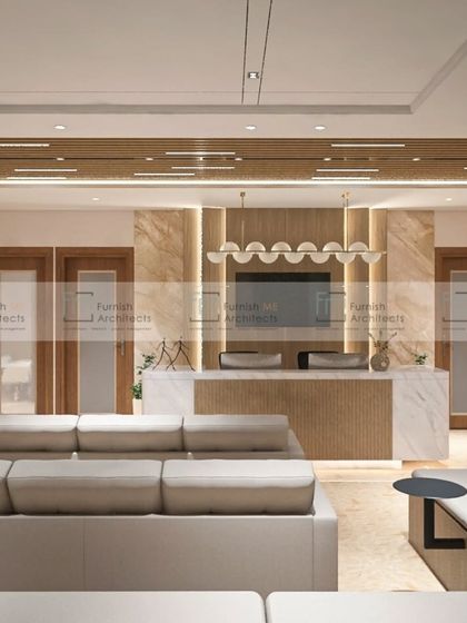 This is a waiting area we designed for a healthcare facility. We used comfortable seating, warm wood tones, and marble accents to create a calming and professional environment for patients and their families.