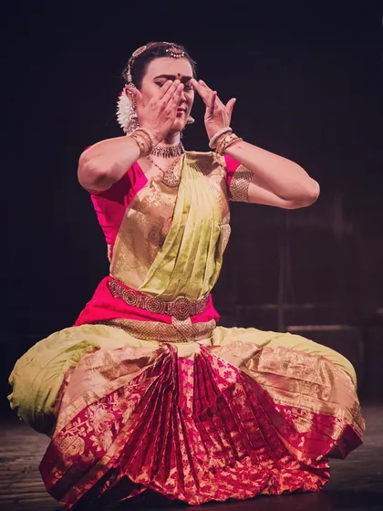 A moment of deep introspection during a performance in Saint Gilles, Reunion Island. The pose, with hands covering the eyes, is a powerful gesture of emotion and storytelling.