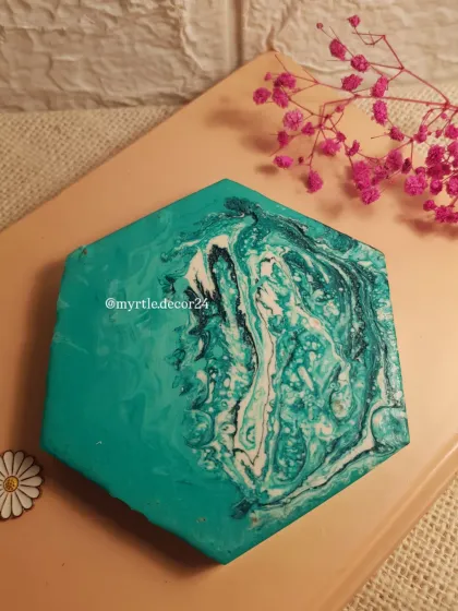 A top-down view of our first-ever hex tray, showing the beautiful, fluid patterns created by the marble technique.