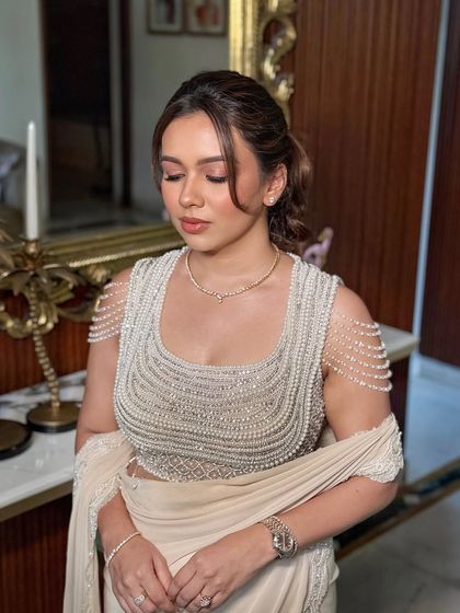 An eyes-closed shot to showcase the soft, blended eyeshadow.