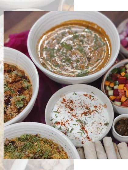 A beautiful spread of Indian dishes for a Diwali celebration, including rich curries, raita, and salad, all ready to be enjoyed.