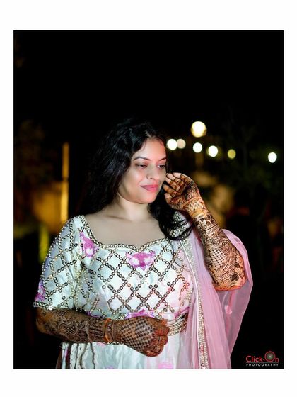 Another portrait from the same Mehndi event, capturing a different expression and angle.