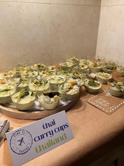 Taking your taste buds to Thailand with these creamy Thai green curry cups. They were part of a travel-themed party menu, offering guests a world of flavors.