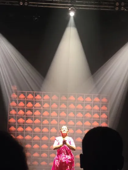 The dramatic lighting and stage design for 'AQEEDAT'. As a curator, I am involved in all aspects of the production to ensure a powerful audience experience.