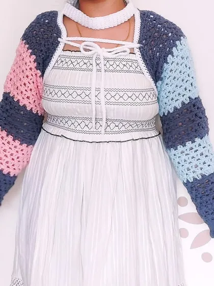 For the stylish Gaea Shrug, I tested the unique construction, including the integrated choker and color-blocked sleeves. I provided feedback on the pattern's clarity and sizing to ensure a comfortable and fashionable fit, resulting in a chic statement piece that was a pleasure to photograph.