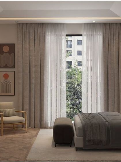 The vision for this bedroom was to create an elegant and luxurious space with a sense of privacy. The room is magnificent yet subdued, with a focus on a calm color palette and comfortable furnishings.