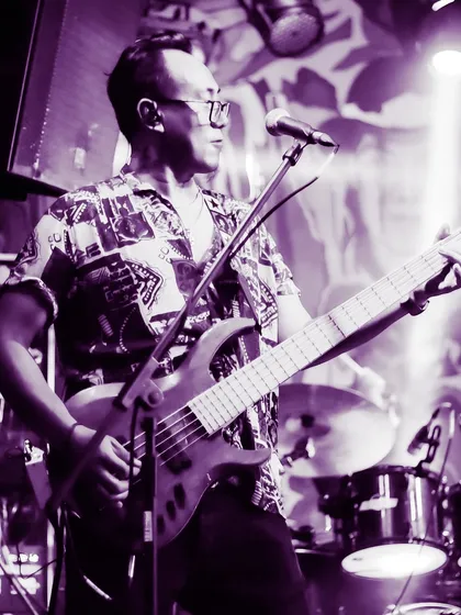 Abel, our bassist, laying down the groove. He is the foundation of our rhythm section, ensuring every song has a beat that you can't help but dance to.