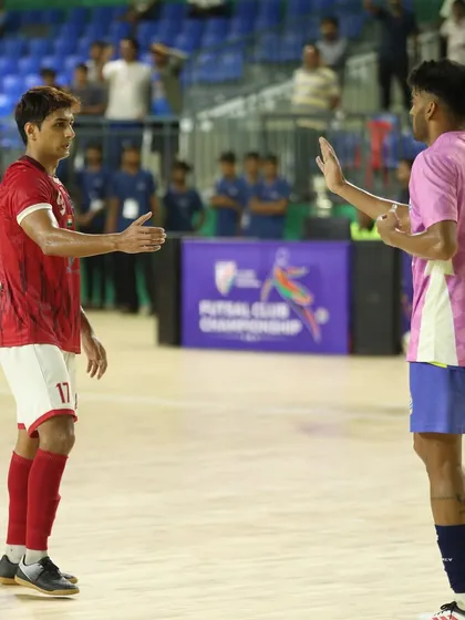 A handshake between opponents after a tough battle. This is what the spirit of futsal is all about.