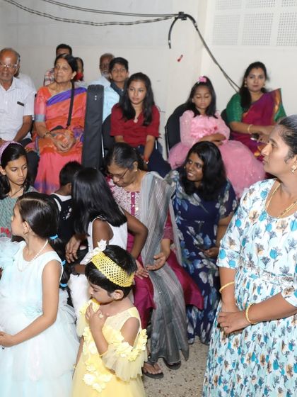 The audience, filled with proud parents, family, and friends, enjoys the student performances at Kalaa Sangama 2023.