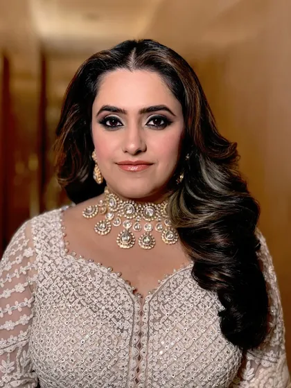A close-up of the Sangeet look, focusing on the dramatic smokey eyes.
