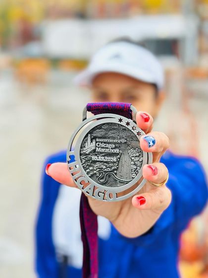 A close-up of the prize. The Chicago Marathon medal is a symbol of perseverance. I ran through nausea and dehydration, but the mind is always stronger than the body.