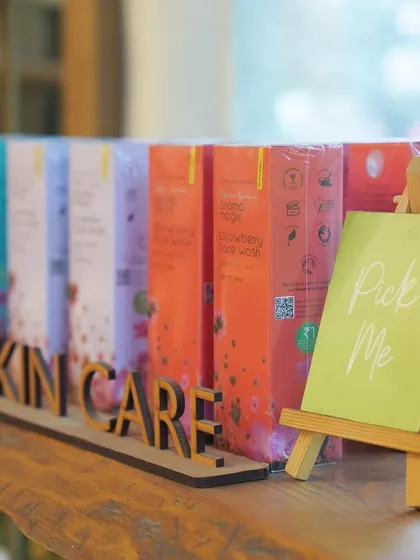 A close-up of my skincare line. The "Pick Me" sign invites you to explore and discover new favorites for your routine.