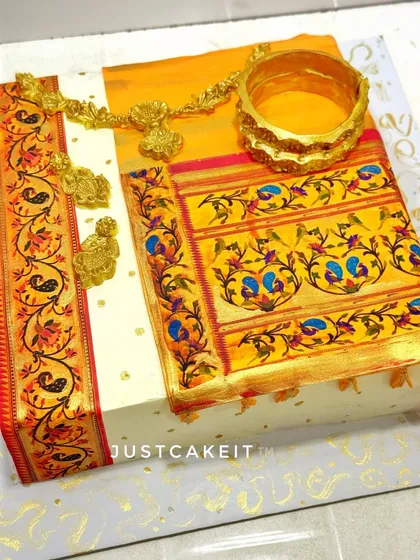 I designed this cake to look like a traditional Paithani saree, complete with intricate, hand-painted borders and edible gold jewellery. It’s a celebration of our rich culture, transformed into a unique and personal cake.