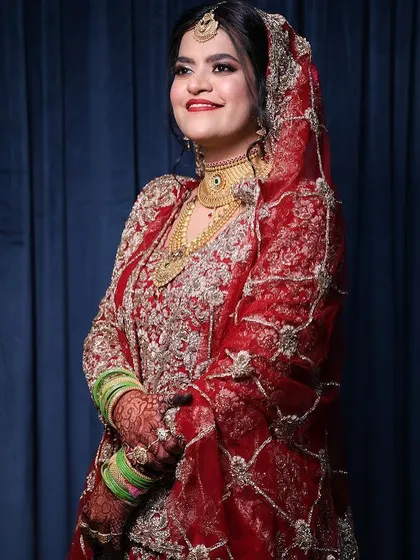 A joyful shot of my bride. My philosophy is that you should look like the best version of yourself, and this natural yet glamorous look achieves just that.