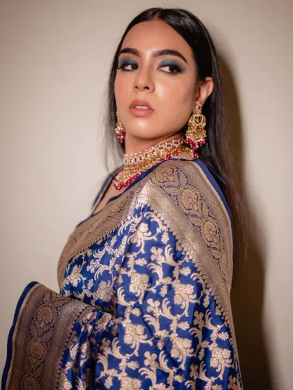 A powerful and striking shot of Sonia. This angle highlights the sharp, clean lines of her smokey eye makeup and the beautiful way it accentuates her features.