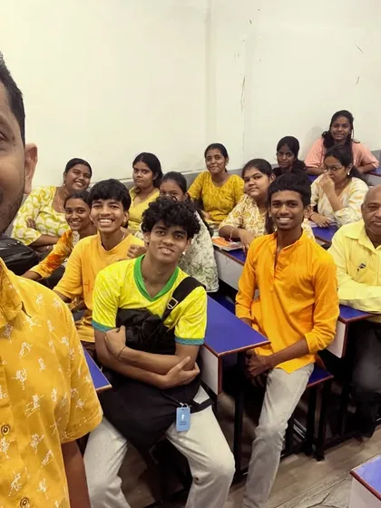 A selfie with a batch of students dressed in yellow, showing the happy and relaxed environment we cultivate.
